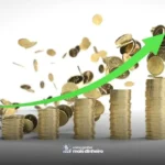Pilha de moedas crescente representando crescimento financeiro
